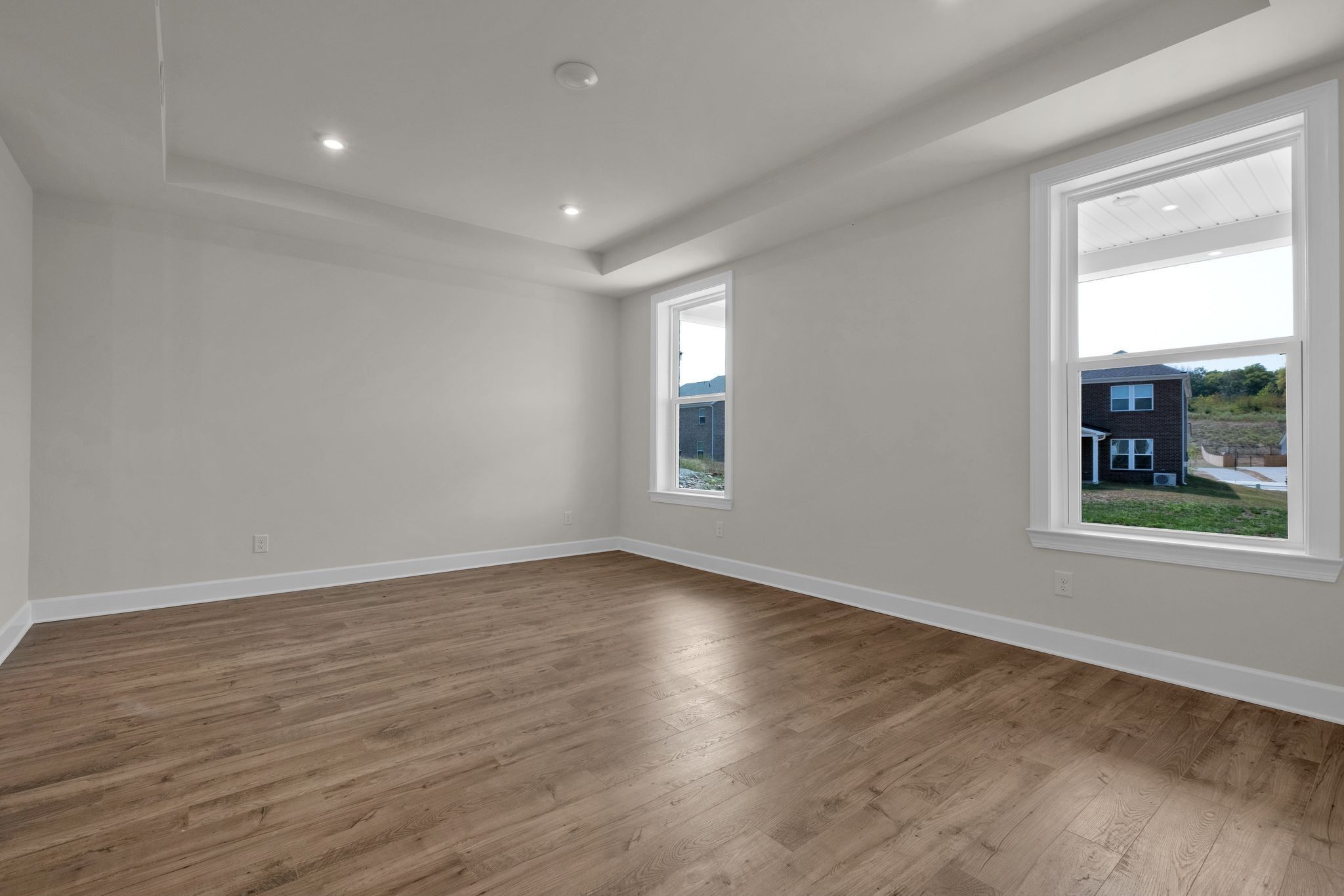 263 Pin High Drive Mount Juliet, TN 37122 - Photo 12 of 34 a view of empty room with wooden floor and fan