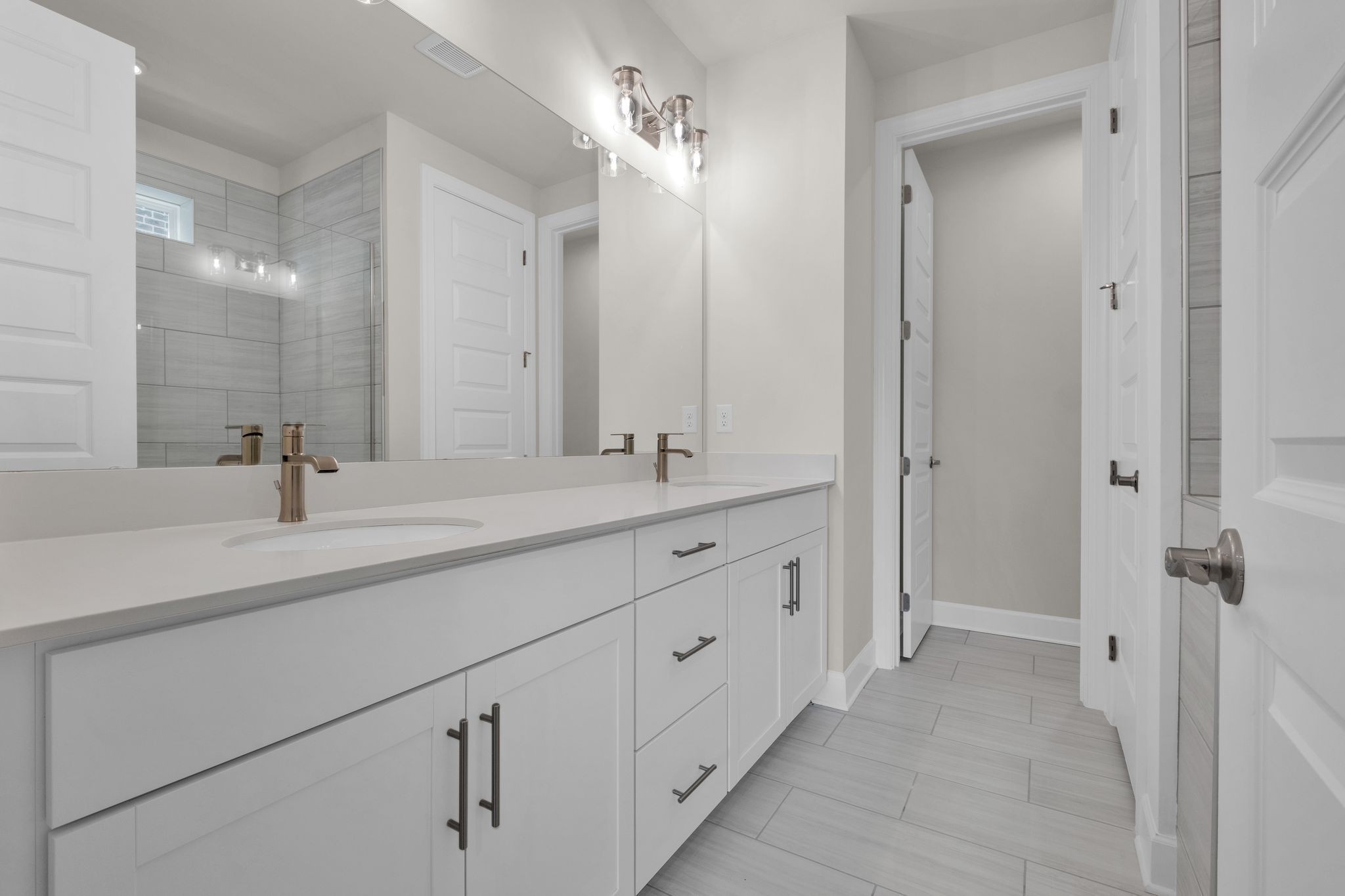 263 Pin High Drive Mount Juliet, TN 37122 - Photo 14 of 34 a bathroom with double vanity sinks and a mirror
