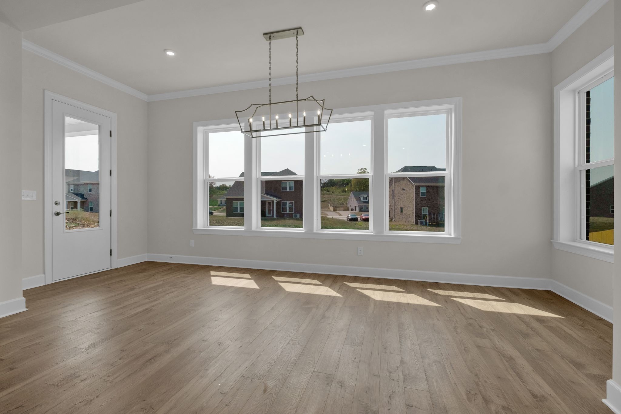 263 Pin High Drive Mount Juliet, TN 37122 - Photo 9 of 34 a view of an empty room with wooden floor and a window