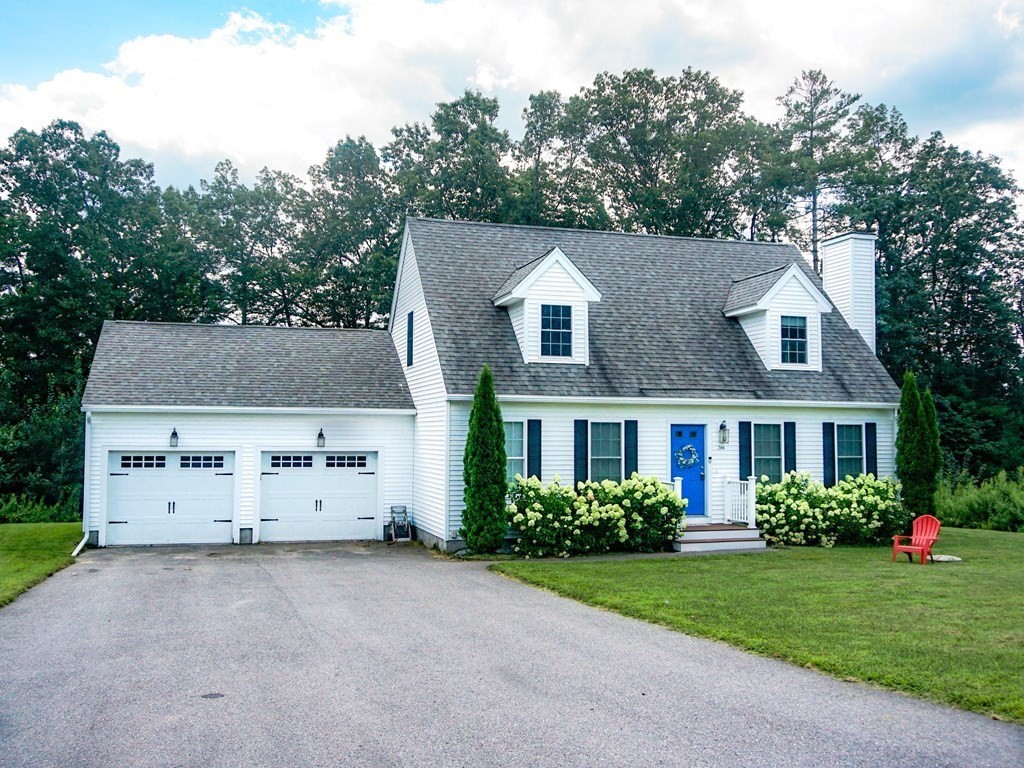 206 Haymeadow Lane Ayer, MA 01432 - Photo 2 of 41 front view of a house with a yard