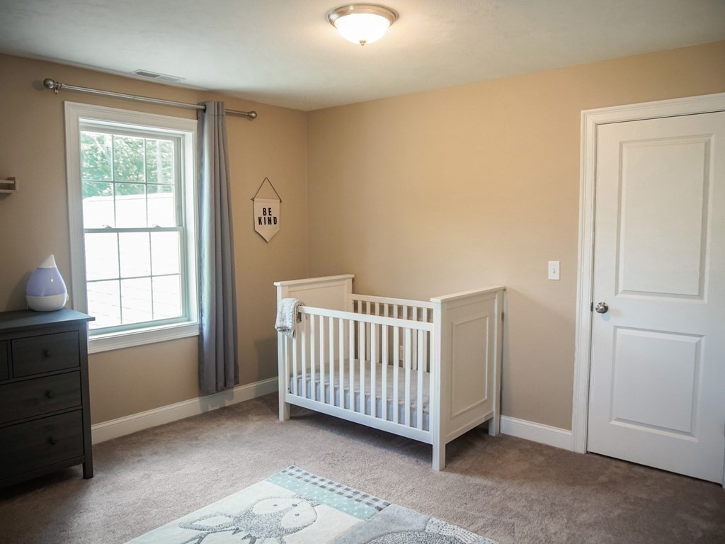 206 Haymeadow Lane Ayer, MA 01432 - Photo 26 of 41 a view of a room with windows