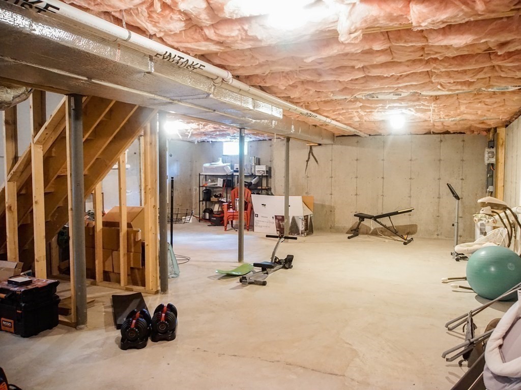 206 Haymeadow Lane Ayer, MA 01432 - Photo 36 of 41 a view of a room with gym equipment