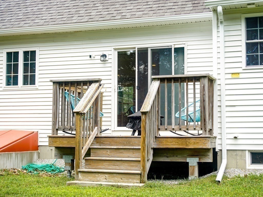 206 Haymeadow Lane Ayer, MA 01432 - Photo 38 of 41 a view of front door of house with a swimming pool
