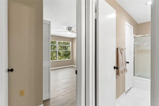 a bathroom with a bathtub and shower