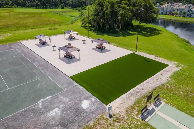 a view of a lake with a big yard