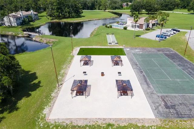 a view of a swimming pool with a garden