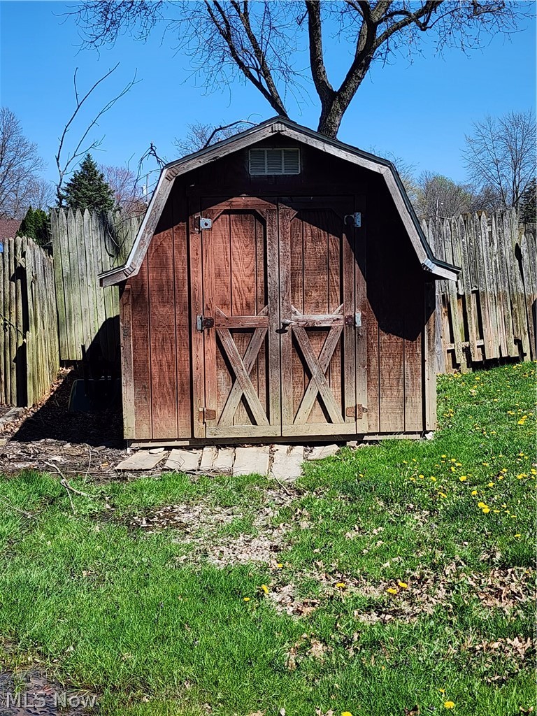 3860 Burkey Road Youngstown, OH 44515 - Photo 3 of 19 View of shed / structure featuring a lawn