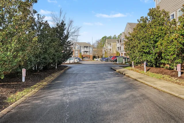 a view of a street with houses