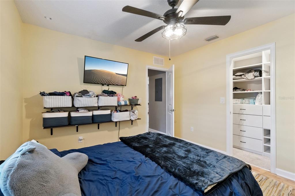 1304 Perkins Road Orlando, FL 32809 - Photo 12 of 22 a living room with furniture and a flat screen tv