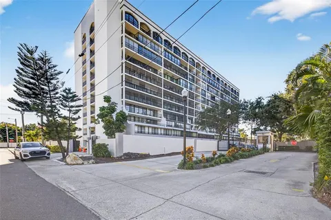 a front view of a building with street view