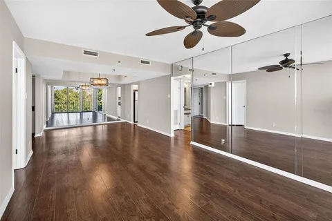 a view of an entryway with wooden floor