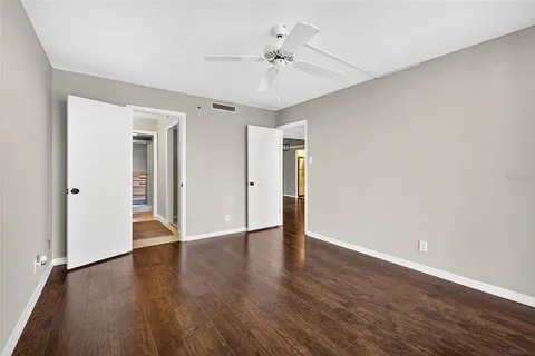 a kitchen with stainless steel appliances granite countertop a sink and a stove