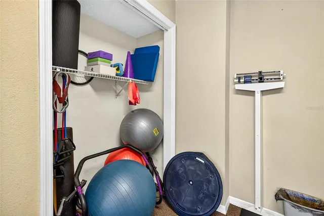 swimming pool view with a seating space