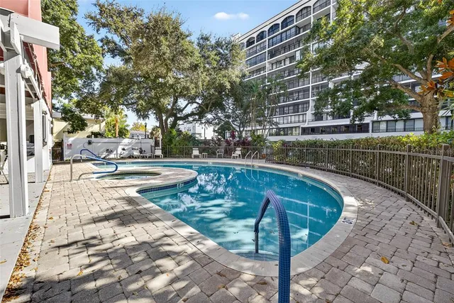 a view of backyard and trees