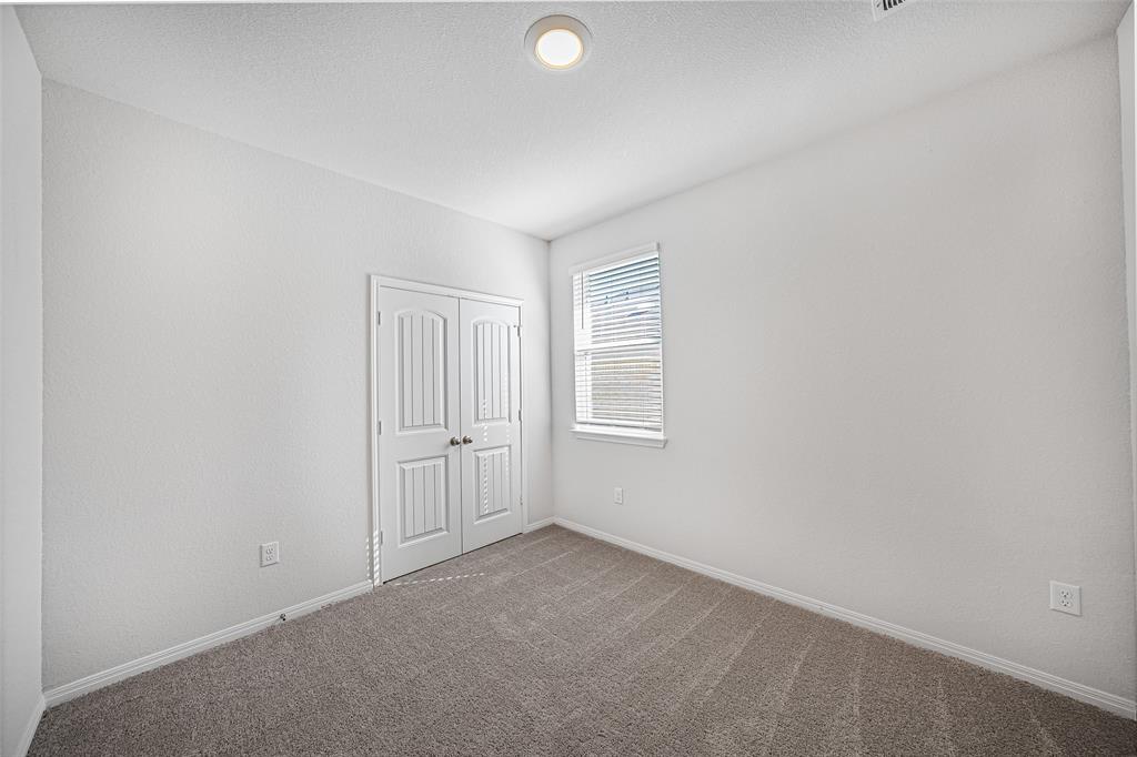 121 Mackinac Lane Georgetown, TX 78626 - Photo 10 of 16 an empty room with windows and closet
