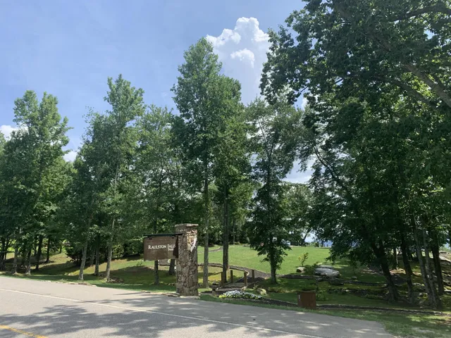 a front view of a house with a yard table and chairs