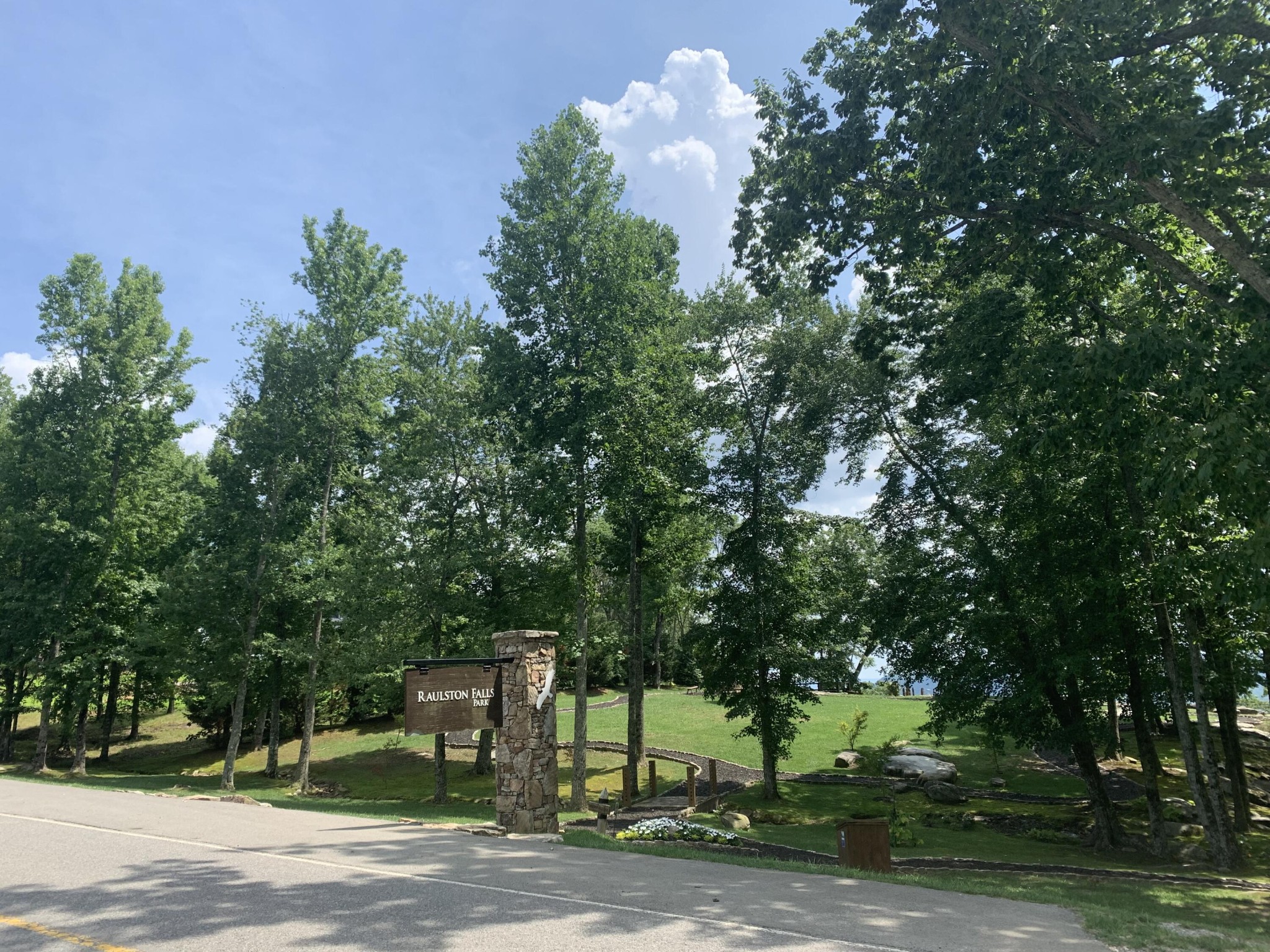 4910 Raulston Falls Drive Jasper, TN 37347 - Photo 35 of 40 a sign that is sitting in front of a tree