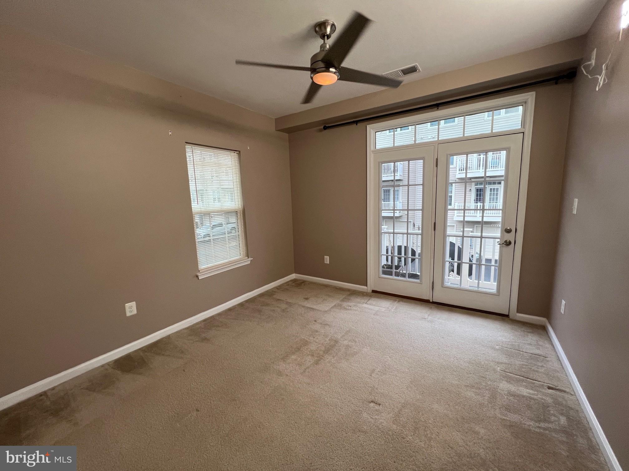 5057 Small Gains Way Frederick, MD 21703 - Photo 16 of 22 a view of an empty room with a window
