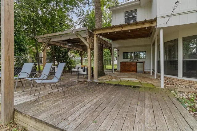 a view of a chair and table on the wooden floor