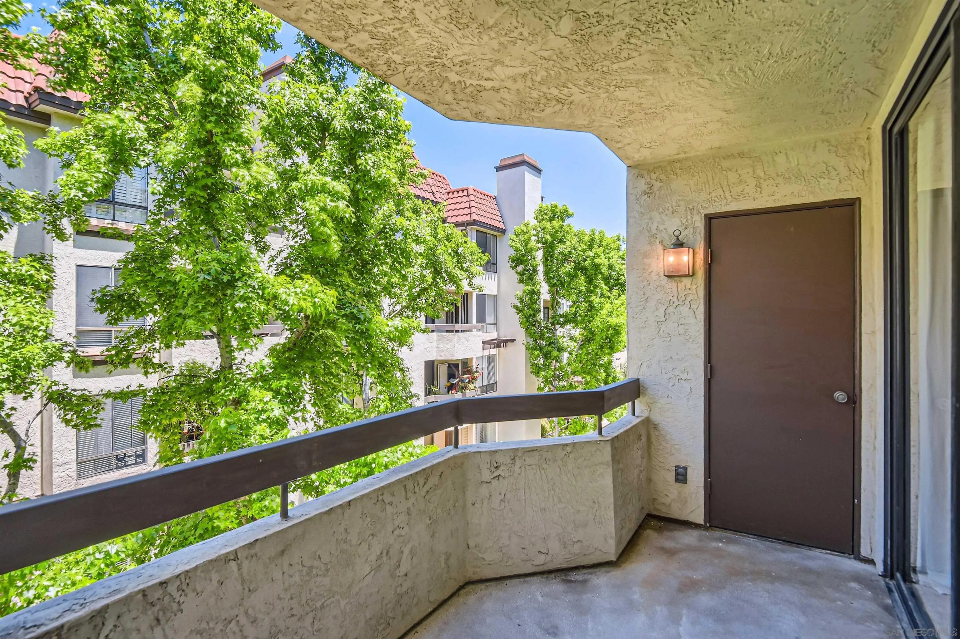 5875 Friars Road, Unit 4309 San Diego, CA 92110 - Photo 18 of 26 a view of a large window with a yard