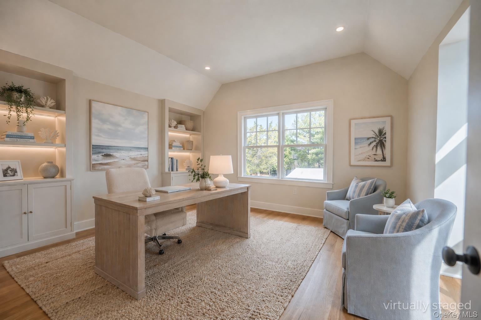 106 Cove Road Asharoken, NY 11768 - Photo 29 of 46 Vaulted ceiling room featuring wood-finish flooring, built-in cabinetry with integrated lighting, and a double window