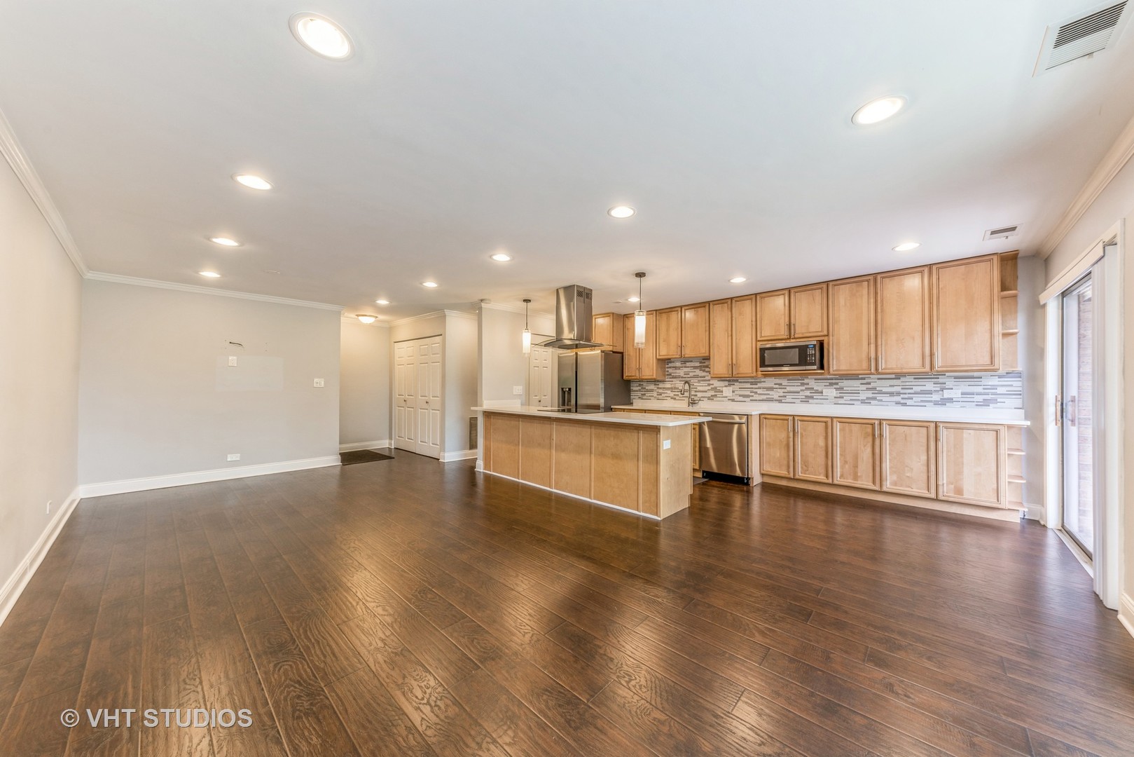 1400 North Elmhurst Road, Unit 219 Mount Prospect, IL 60056 - Photo 3 of 10 a view of kitchen with kitchen island sink and center island