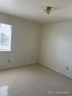 8246 Manitou Springs Road Blanca, CO 81123 - Photo 14 of 24 an empty room with a window