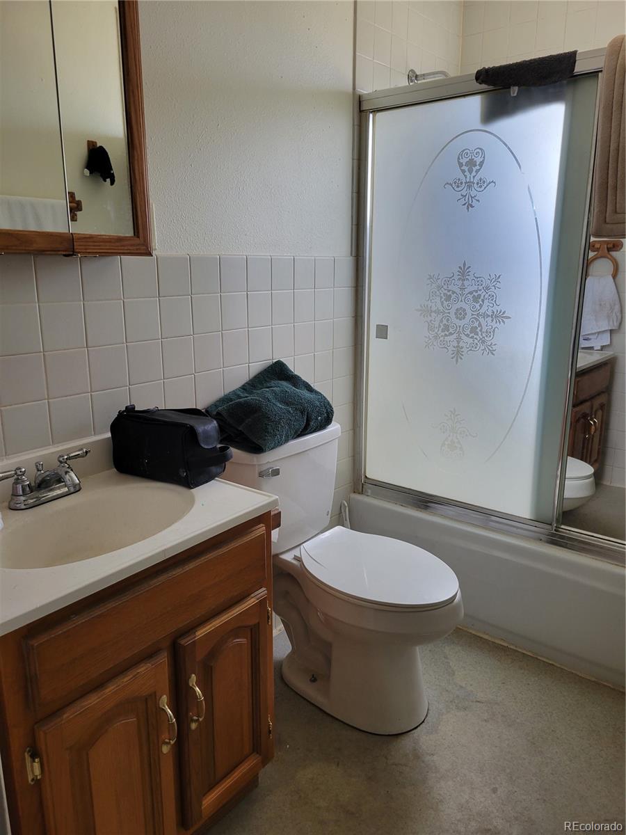 8246 Manitou Springs Road Blanca, CO 81123 - Photo 16 of 24 a bathroom with a sink and a toilet