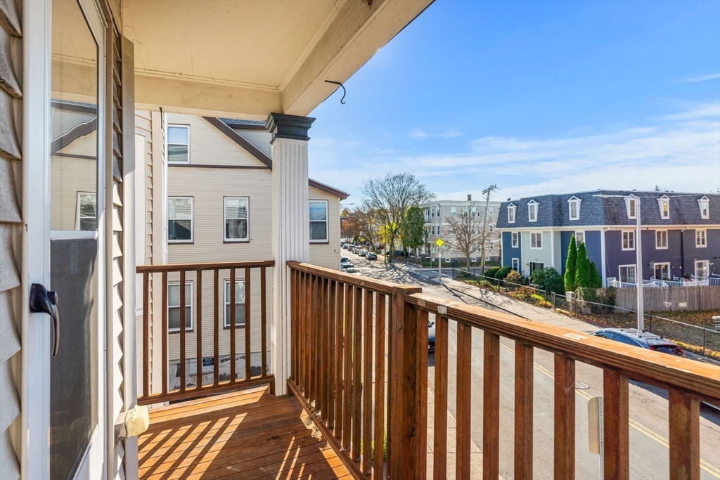 372 Adams Street, Unit 2 Boston, MA 02122 - Photo 8 of 20 a view of a street from a balcony