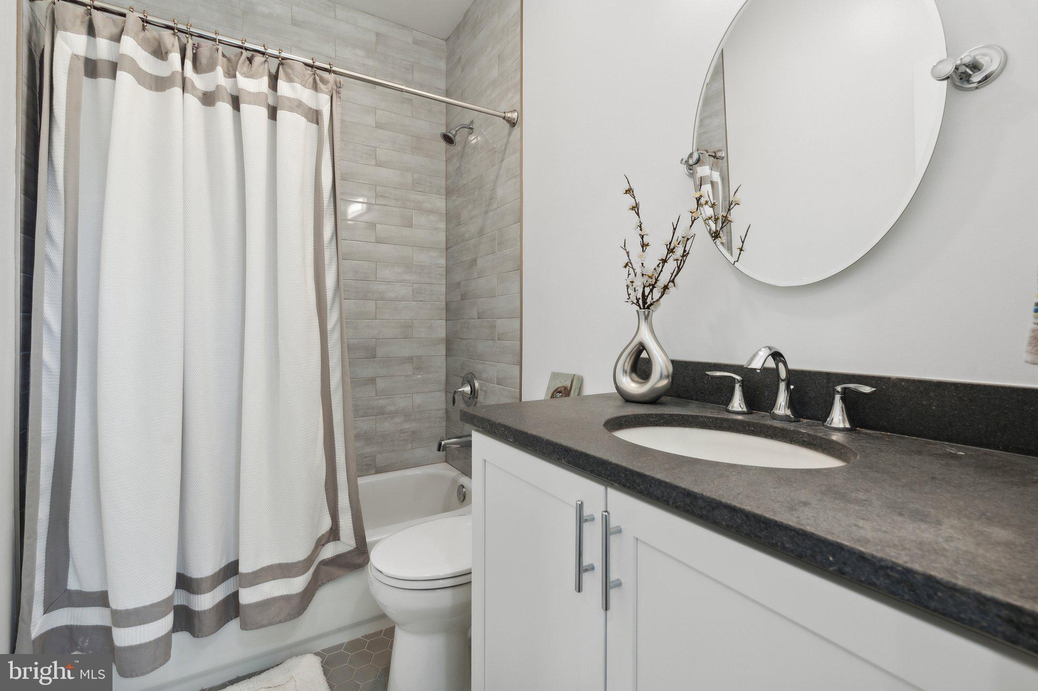 1918 Anderson Road Falls Church, VA 22043 - Photo 35 of 51 And the hallway bathroom has a tub/shower