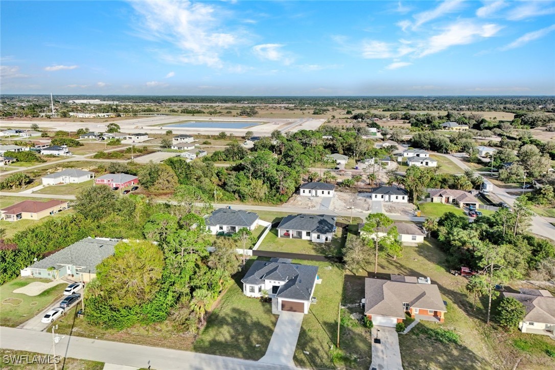 347 Ranch Avenue Lehigh Acres, FL 33974 - Photo 1 of 30 an aerial view of a city