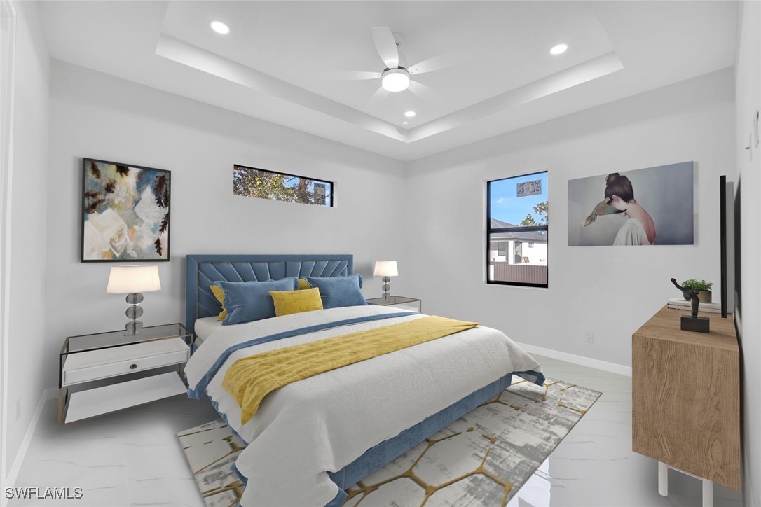 347 Ranch Avenue Lehigh Acres, FL 33974 - Photo 14 of 30 a bedroom with a bed and a couch