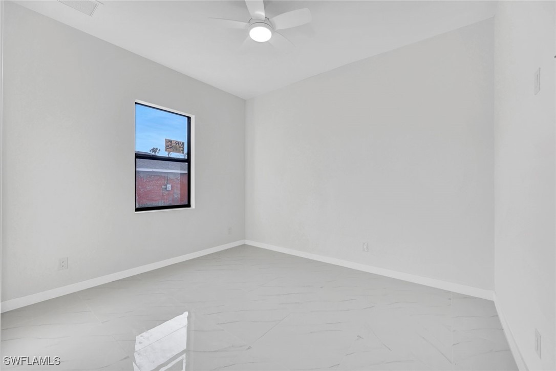 347 Ranch Avenue Lehigh Acres, FL 33974 - Photo 20 of 30 a view of an empty room
