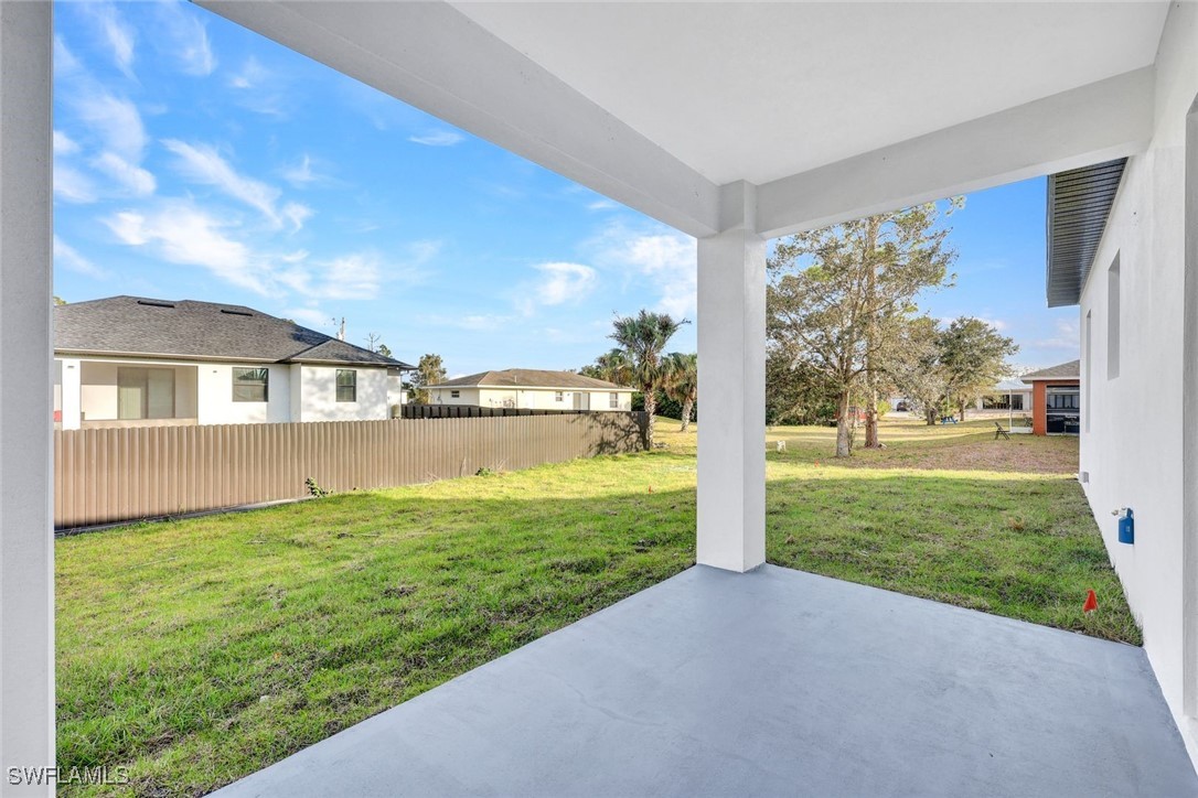347 Ranch Avenue Lehigh Acres, FL 33974 - Photo 24 of 30 a view of a garden with a yard