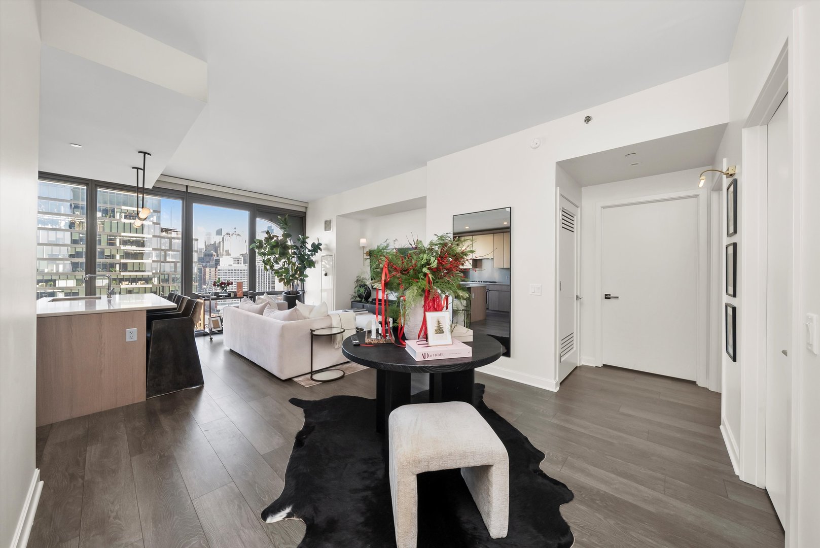 164 North Peoria Street, Unit 1705 Chicago, IL 60607 - Photo 2 of 33 a view of a dining room with furniture and wooden floor