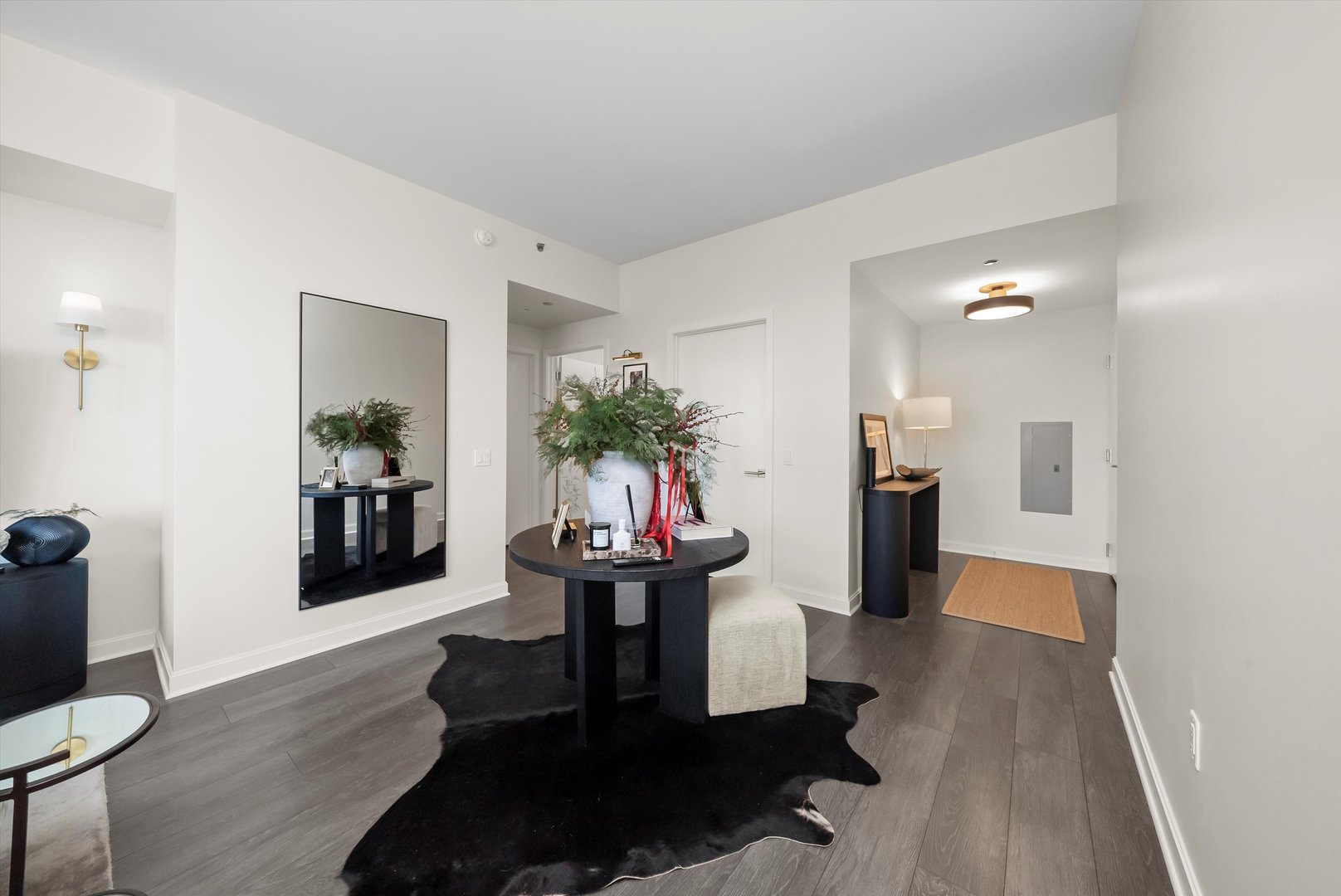 164 North Peoria Street, Unit 1705 Chicago, IL 60607 - Photo 22 of 33 a living room with furniture and a potted plant