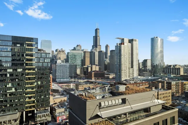 a view of city with tall buildings