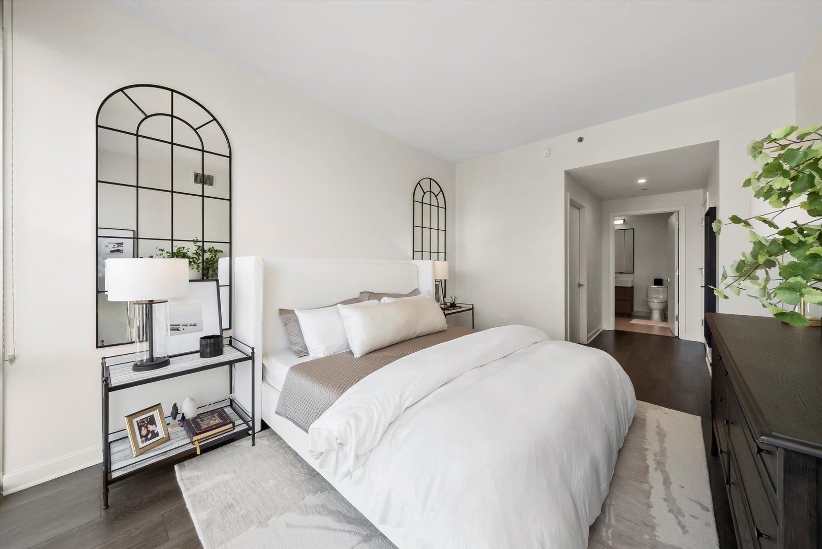 164 North Peoria Street, Unit 1705 Chicago, IL 60607 - Photo 10 of 33 a bedroom with bed and a window