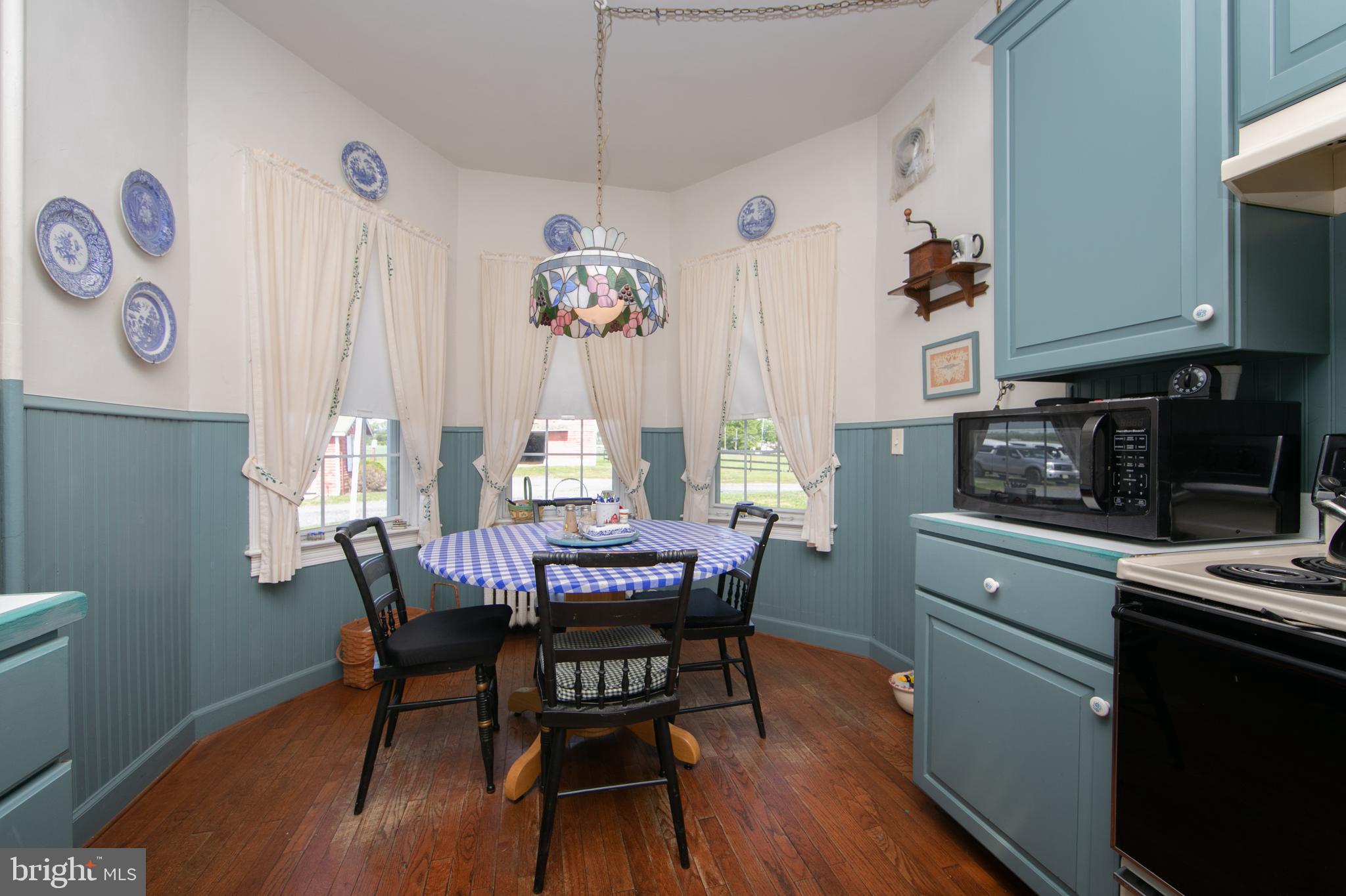 111 Newbolds Corner Road Southampton, NJ 08088 - Photo 41 of 96 a view of a dining room with furniture window and wooden floor