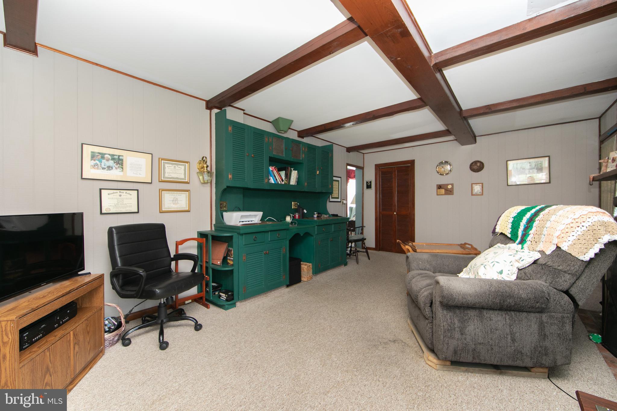 111 Newbolds Corner Road Southampton, NJ 08088 - Photo 46 of 96 a living room with furniture and a flat screen tv