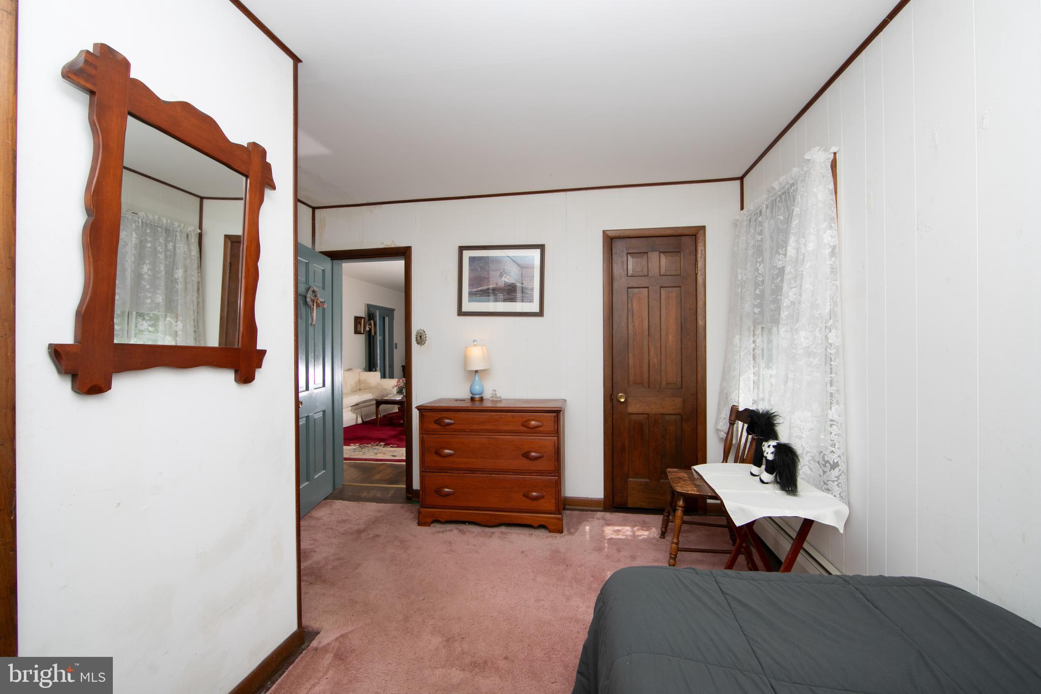 111 Newbolds Corner Road Southampton, NJ 08088 - Photo 48 of 96 a living room with furniture and a baby crib