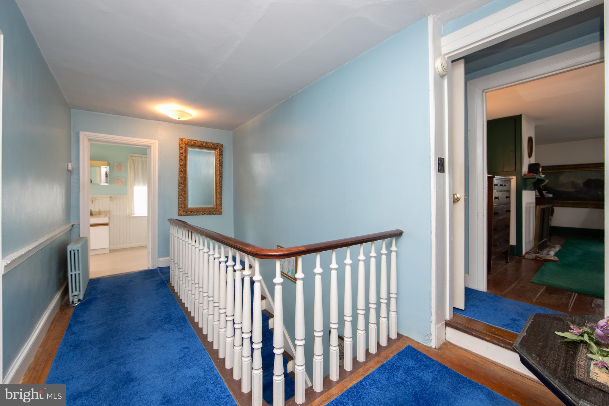 111 Newbolds Corner Road Southampton, NJ 08088 - Photo 54 of 96 a view of a hallway with wooden floor and a livingroom