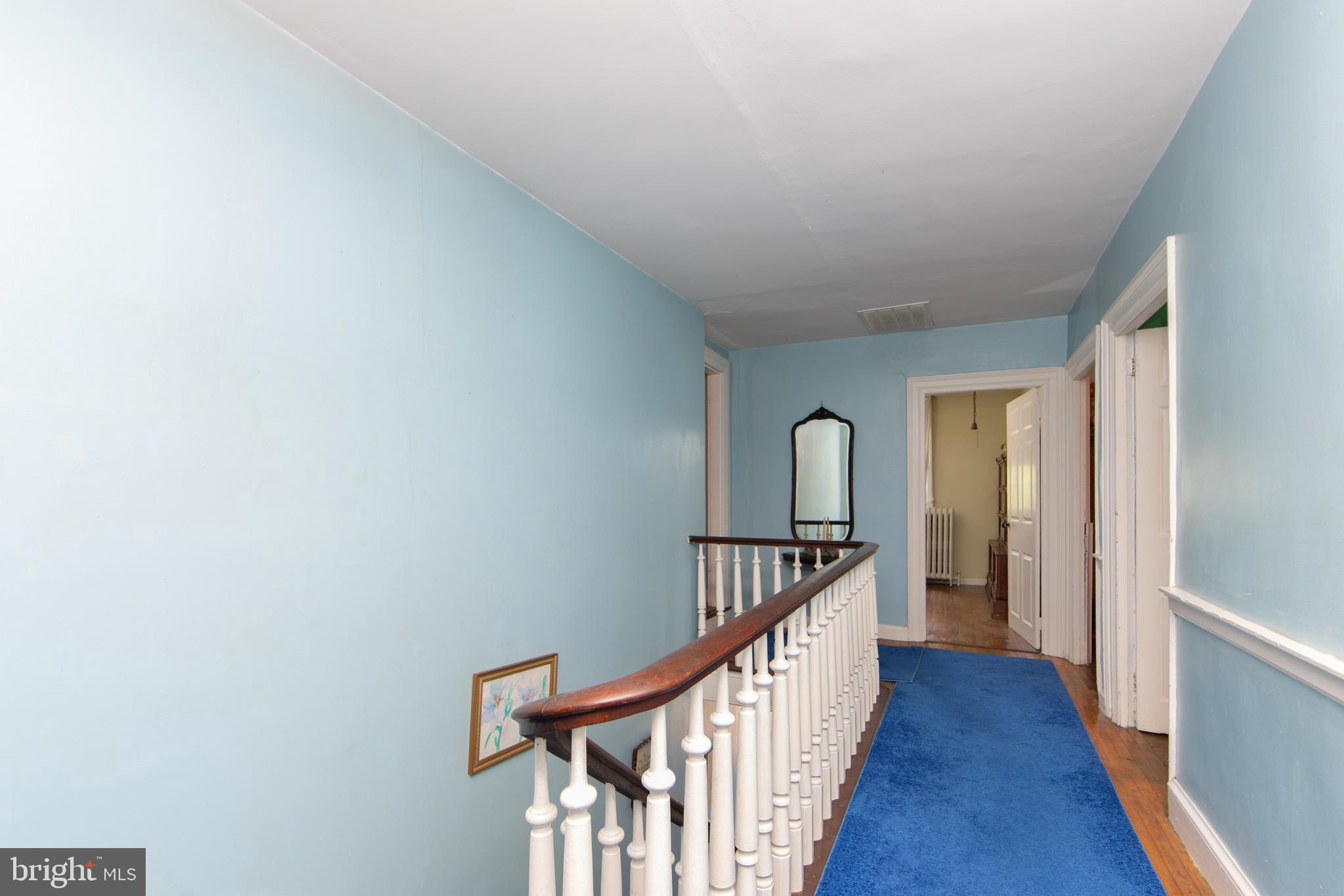 111 Newbolds Corner Road Southampton, NJ 08088 - Photo 55 of 96 a view of a hallway with wooden floor and staircase