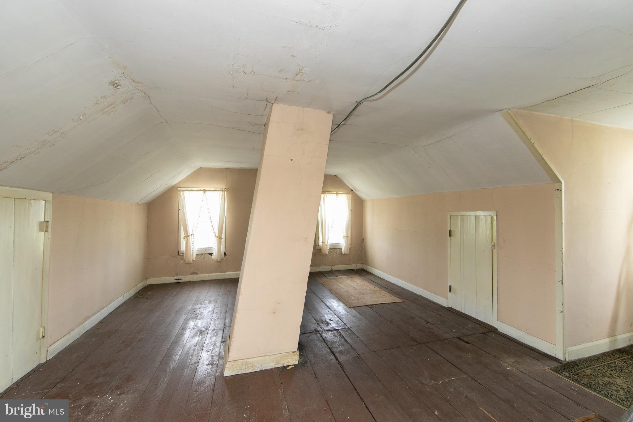 111 Newbolds Corner Road Southampton, NJ 08088 - Photo 69 of 96 a view of an empty room with wooden floor and a window