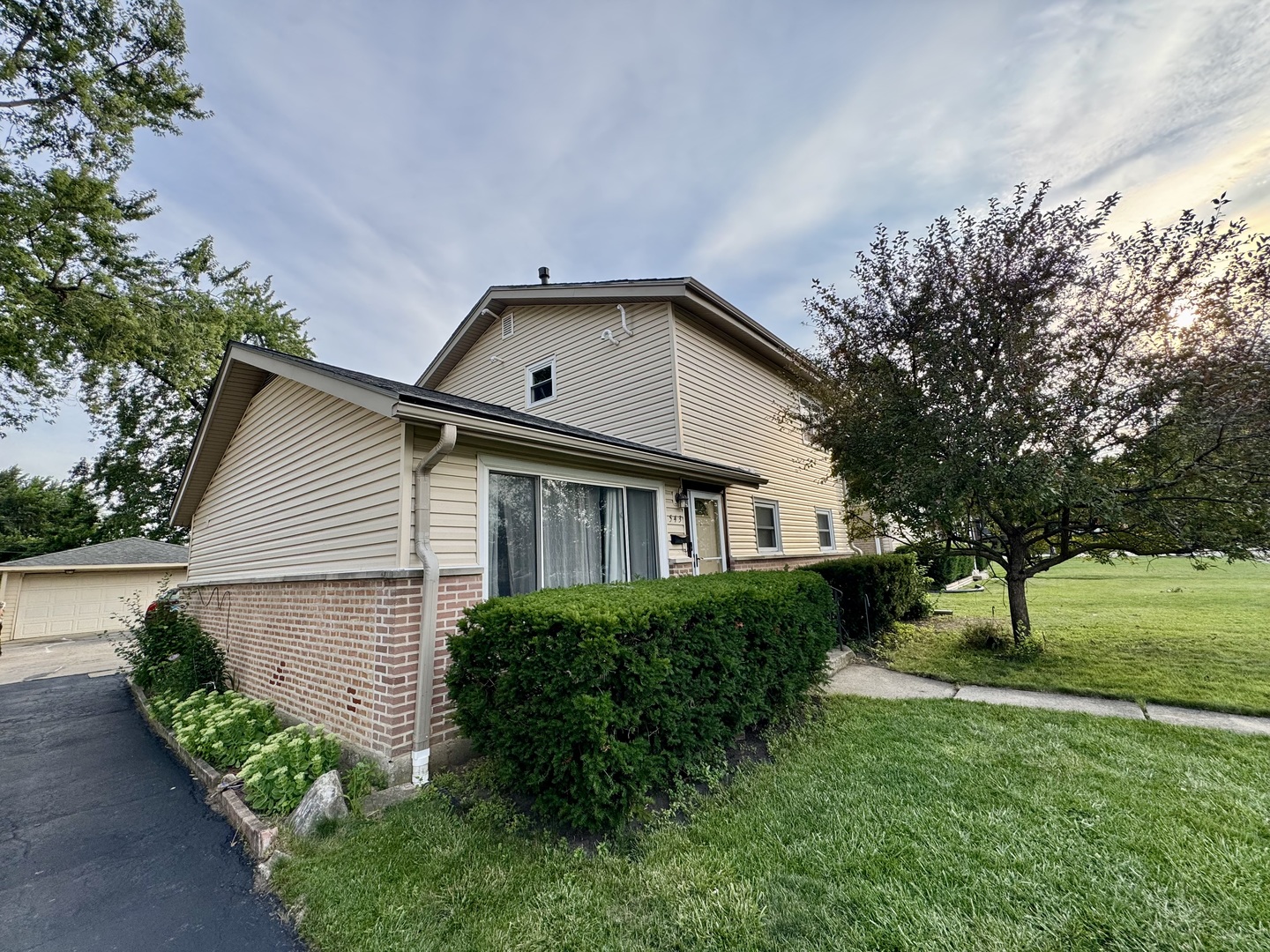 543 Rose Avenue Addison, IL 60101 - Photo 1 of 18 a front view of a house with a yard