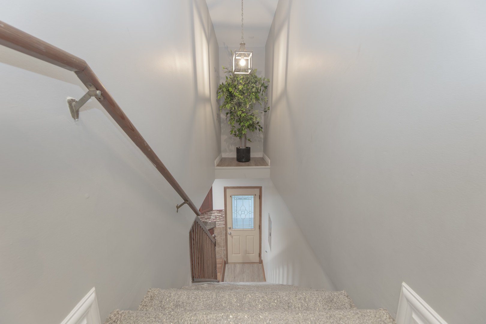 543 Rose Avenue Addison, IL 60101 - Photo 12 of 18 a view of a hallway with stairs