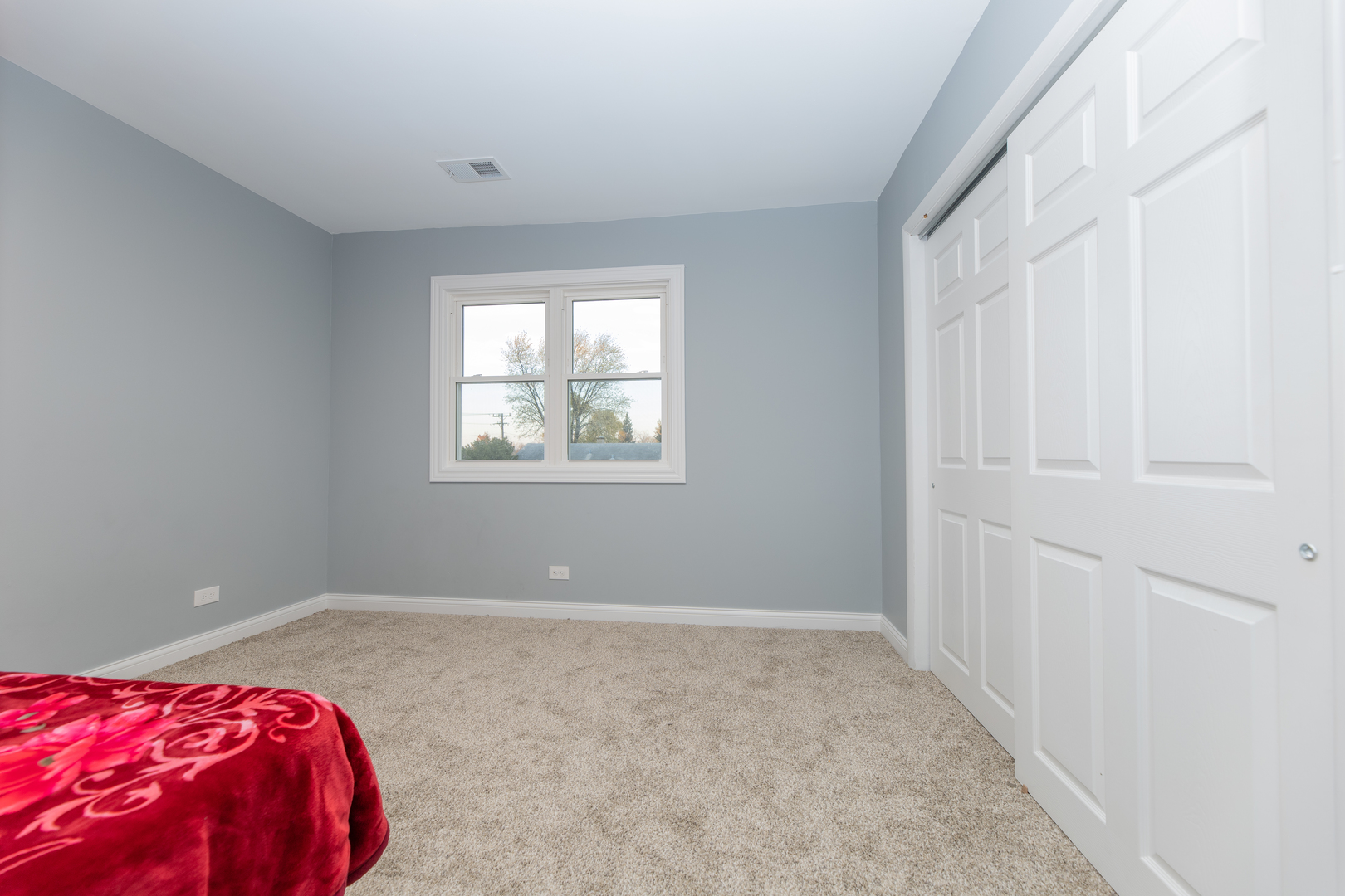 543 Rose Avenue Addison, IL 60101 - Photo 15 of 18 a view of a bedroom with window