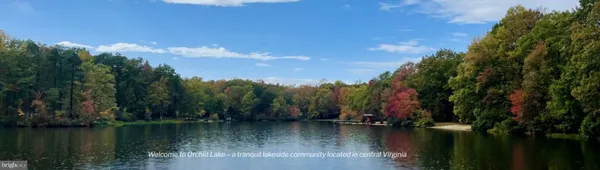 a view of a garden with a house