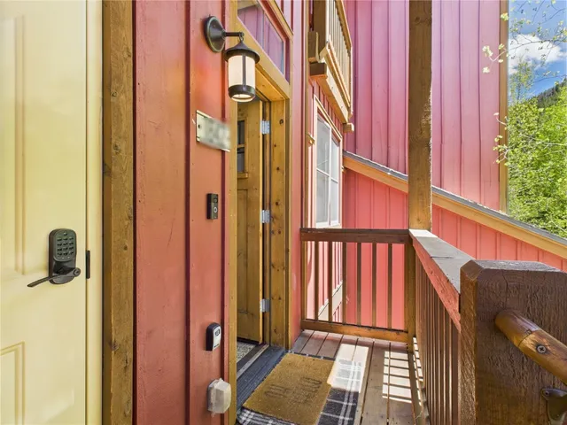 a view of a balcony with a door