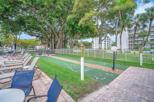 a kitchen with a stove microwave and cabinets